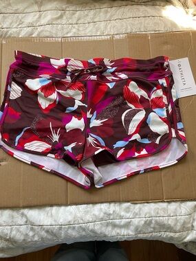 Athleta Burgundy Floral Print Running Shorts with Pink & White Accents
